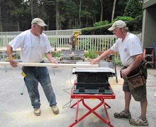 Johnny B and Lenny trimming one of the stiffeners for the door panel